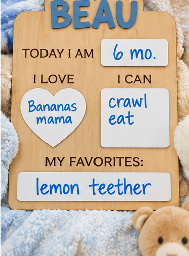 Baby milestone board with write-on cards