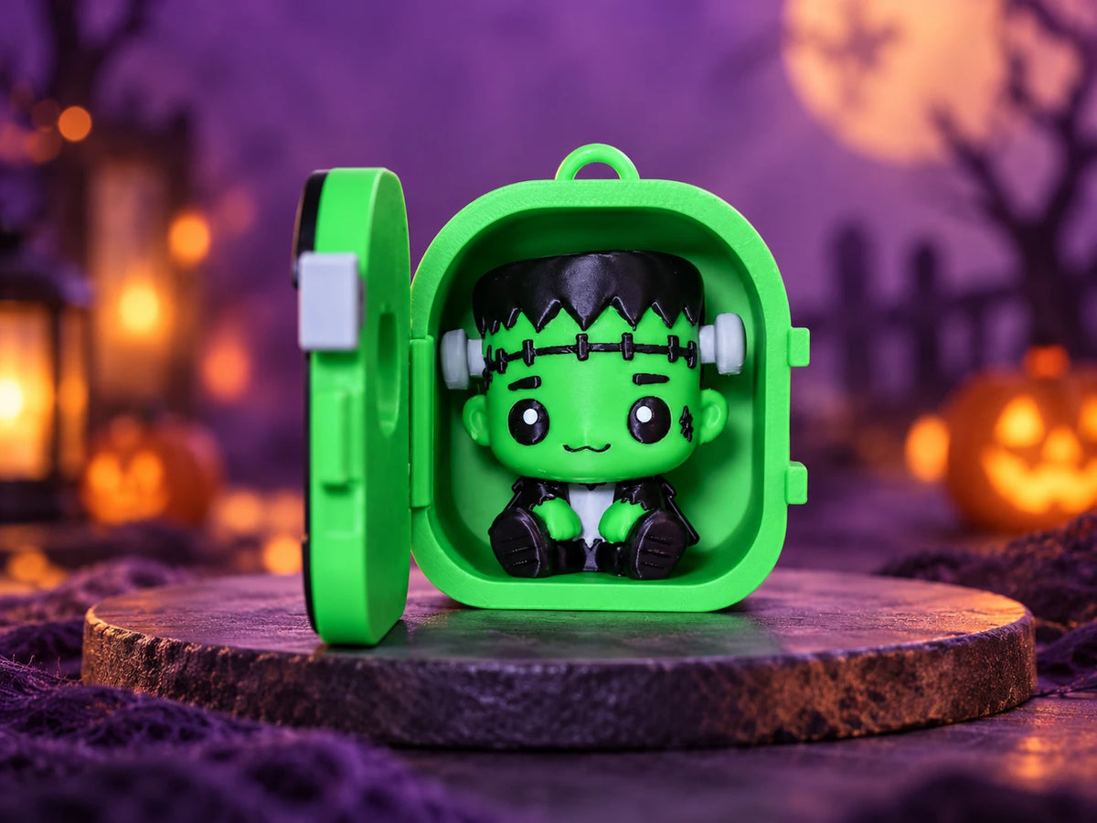 Frankenstein Pocket Pal sitting inside his open case