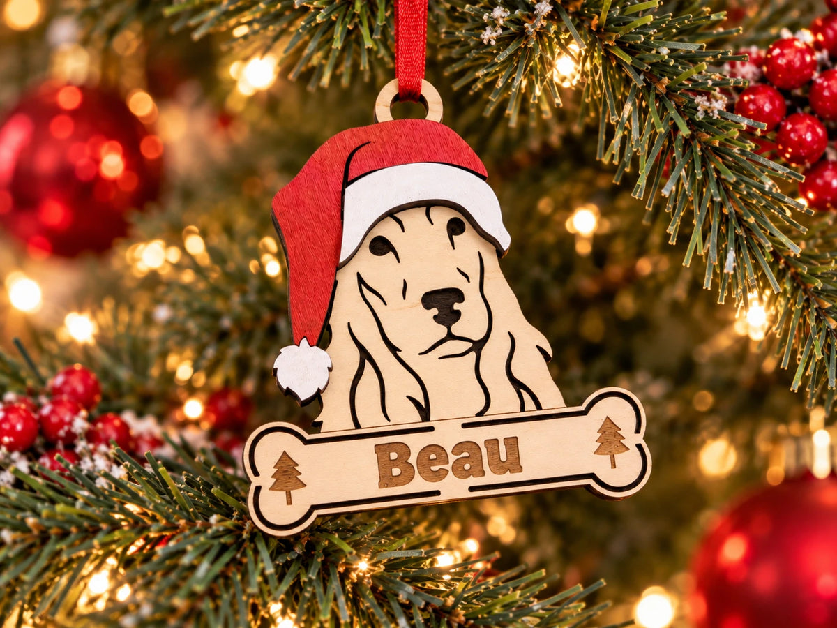 Cocker Spaniel Santa dog ornament on tree