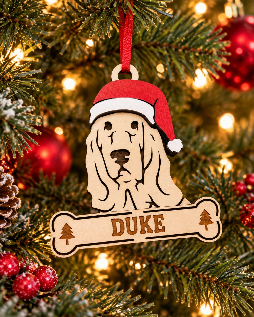 Cocker Spaniel Santa dog ornament on tree