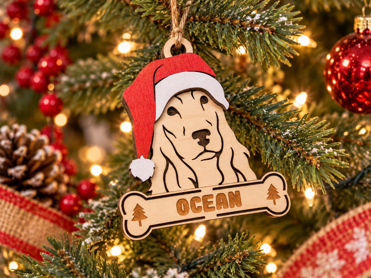 Cocker Spaniel Santa dog ornament on tree