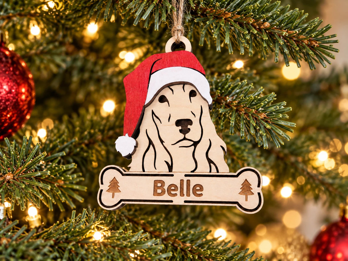 Cocker Spaniel Santa dog ornament on tree